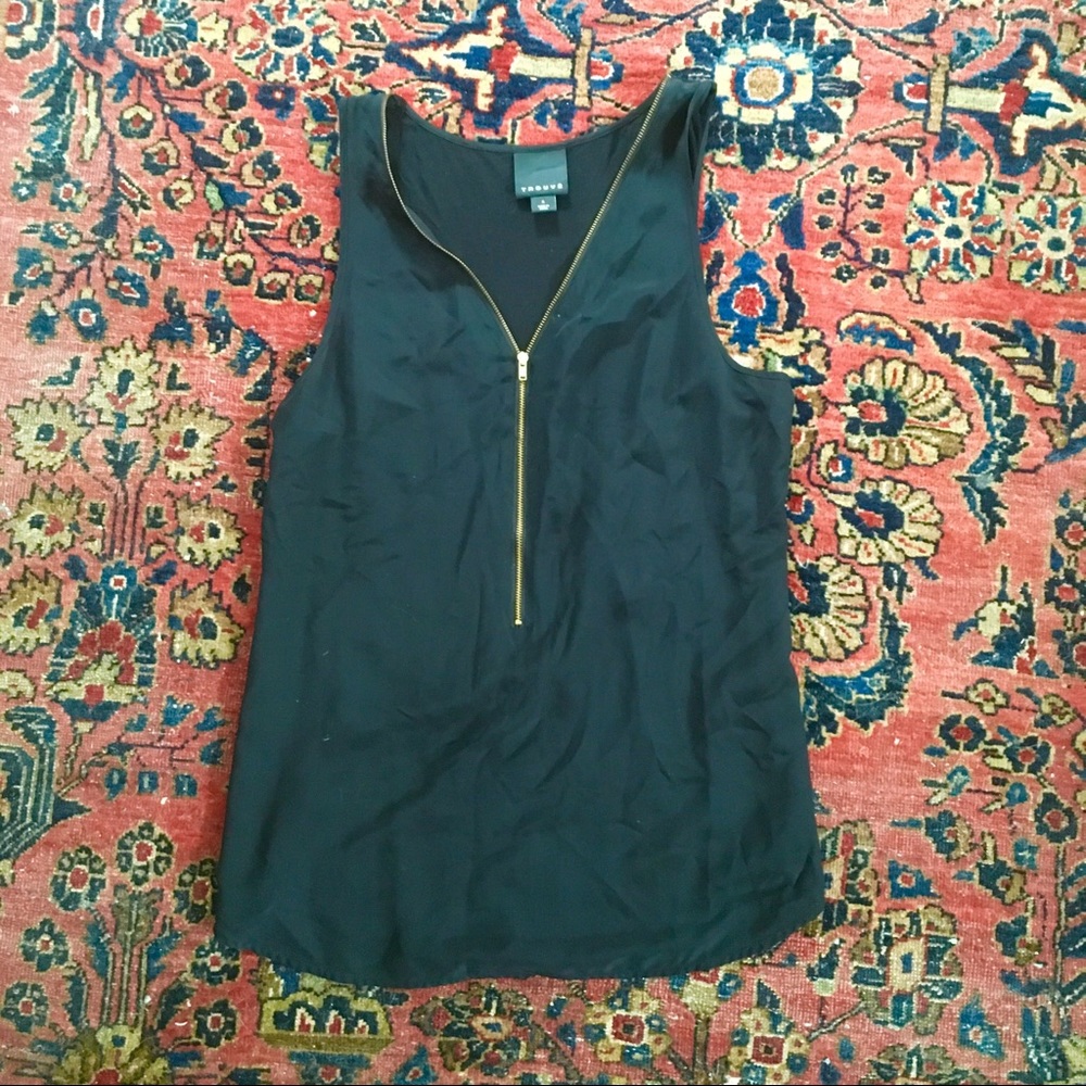 Black tank with zipper.